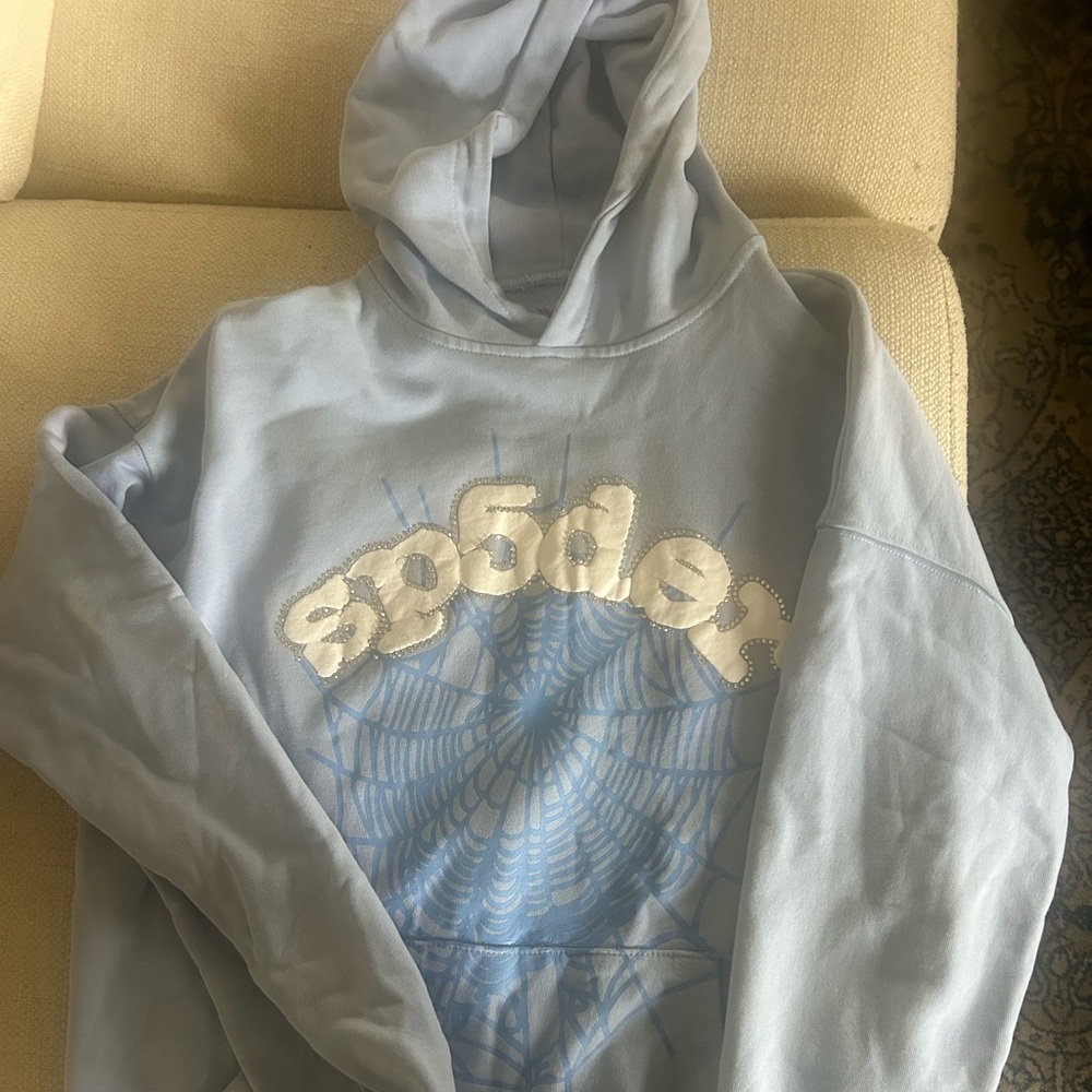 Sp5der Hoodie. No stains or cuff wear. A few missing stones.